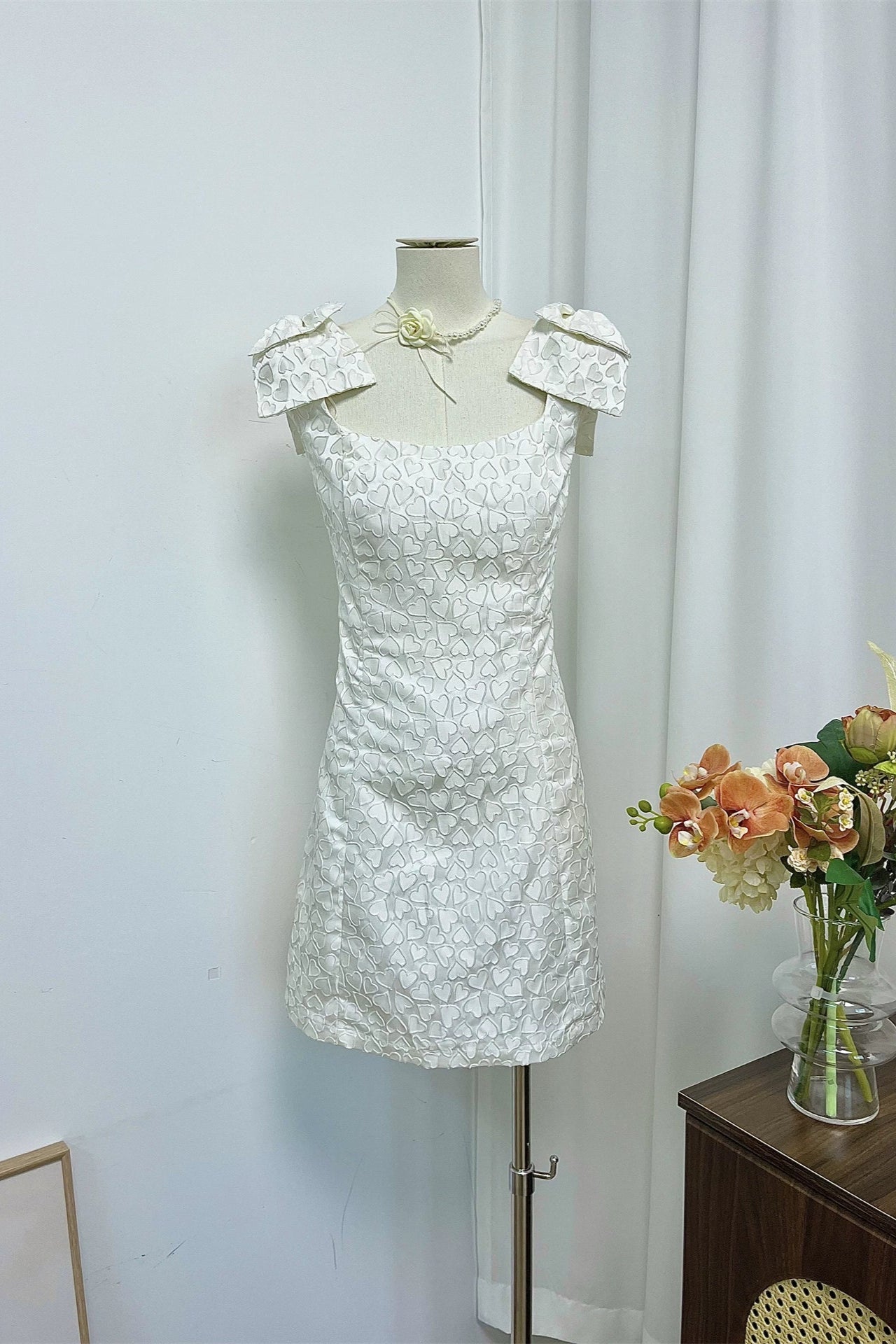 white bow print mini dress