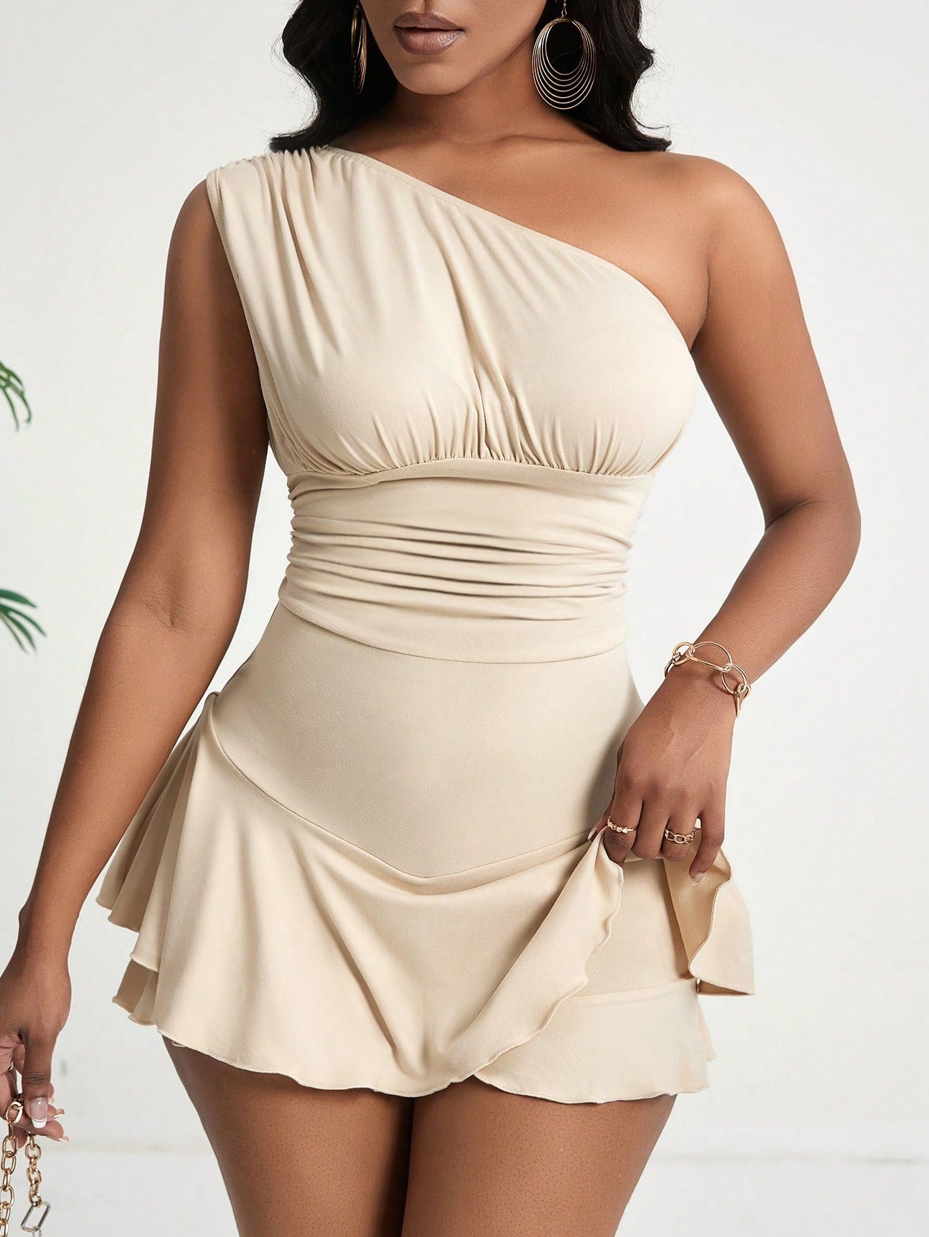 Asymmetrical high-waisted ruffled mini dress