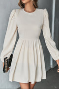 apricot A-line backless long-sleeved dress