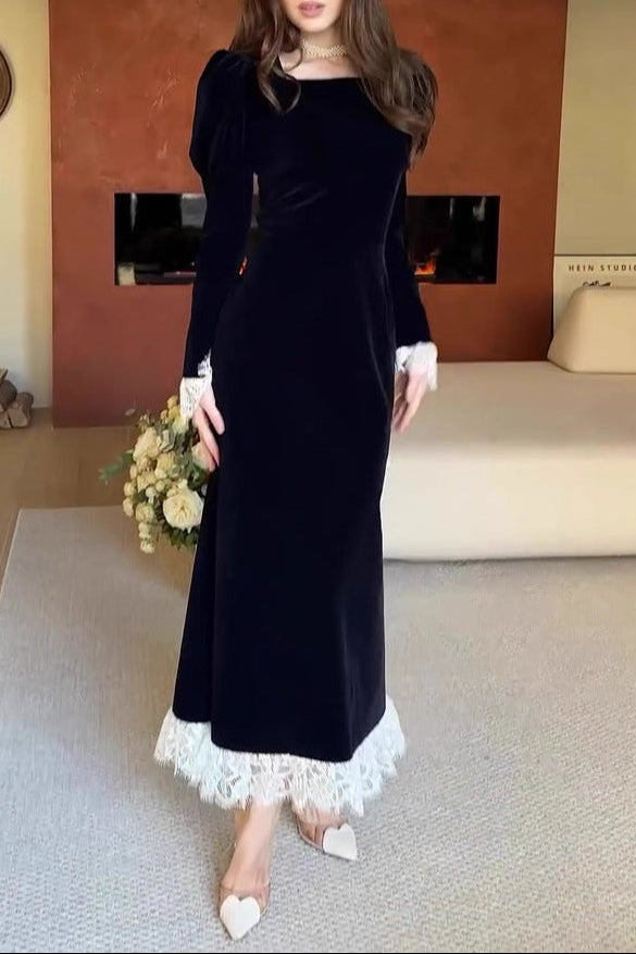 black long-sleeved waist-cinching dress