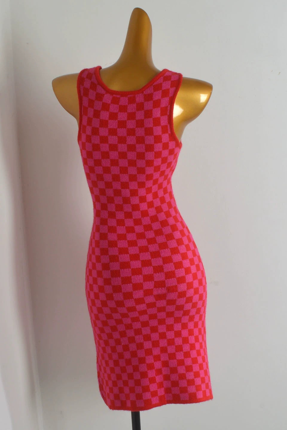 pink suspender checkerboard midi dress