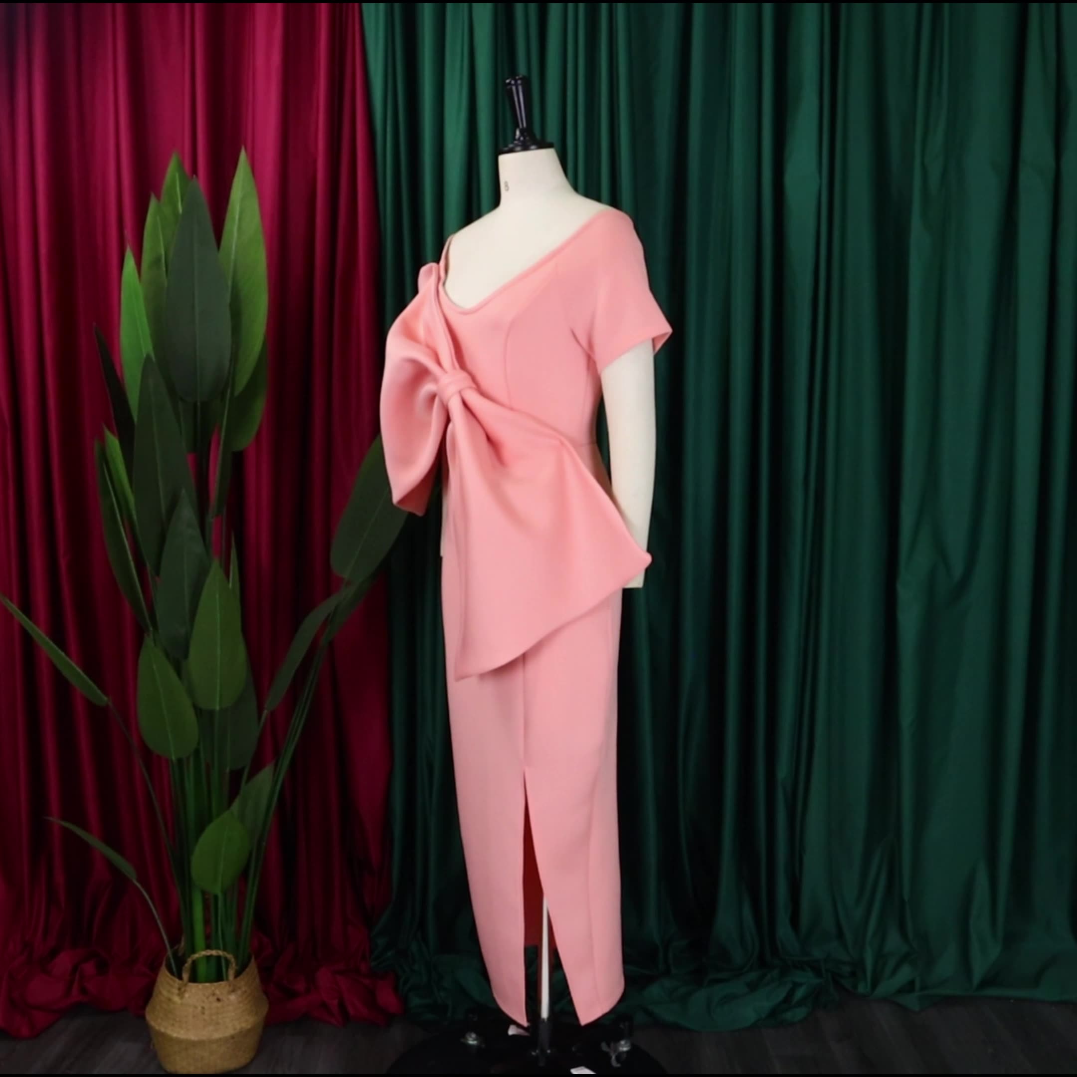 Dress With A Large Bow Slit