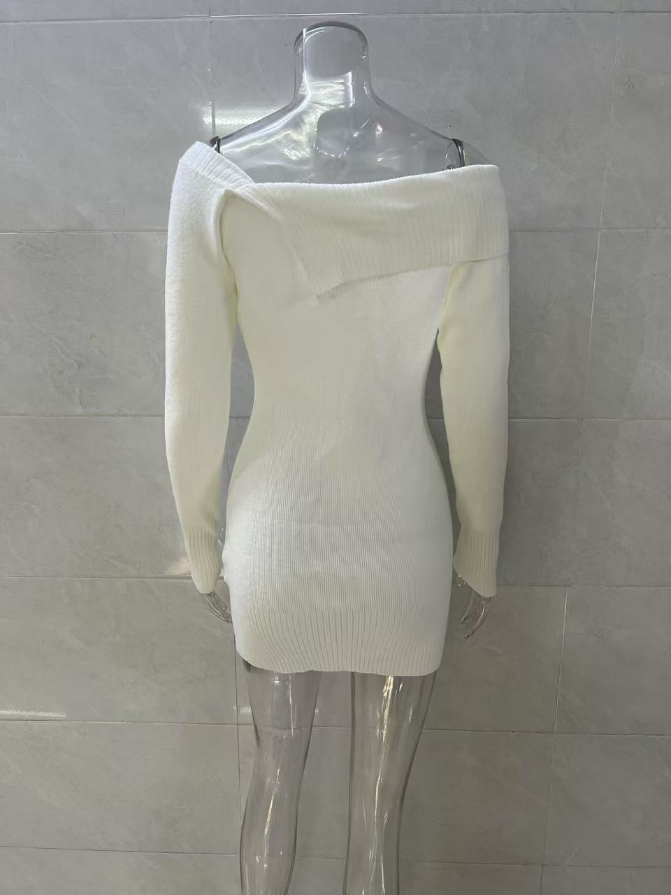white off-the-shoulder long-sleeved knitted dress