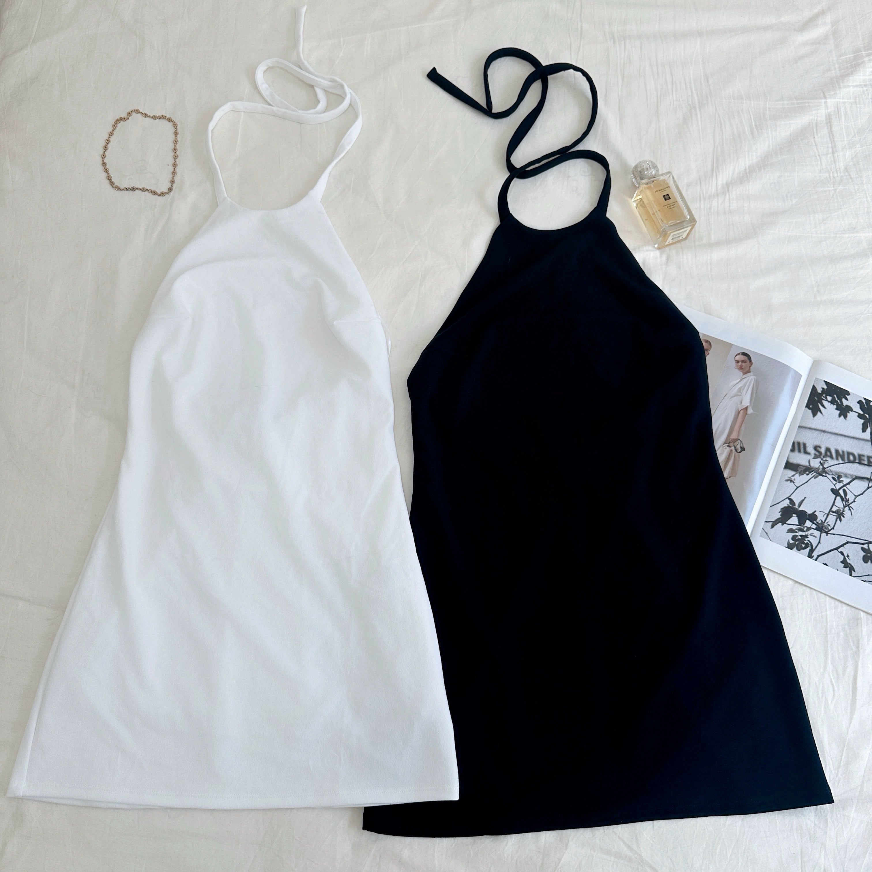 white halterneck open back A-line dress