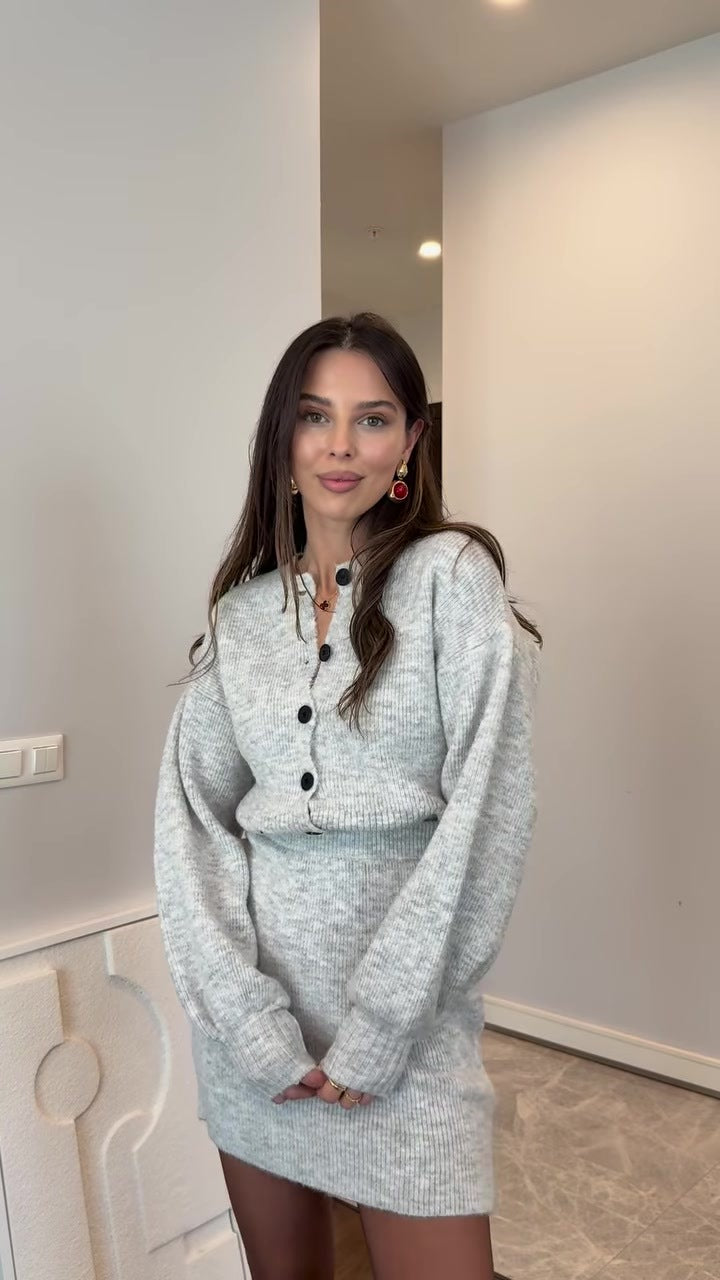 light grey long-sleeved short skirt suit