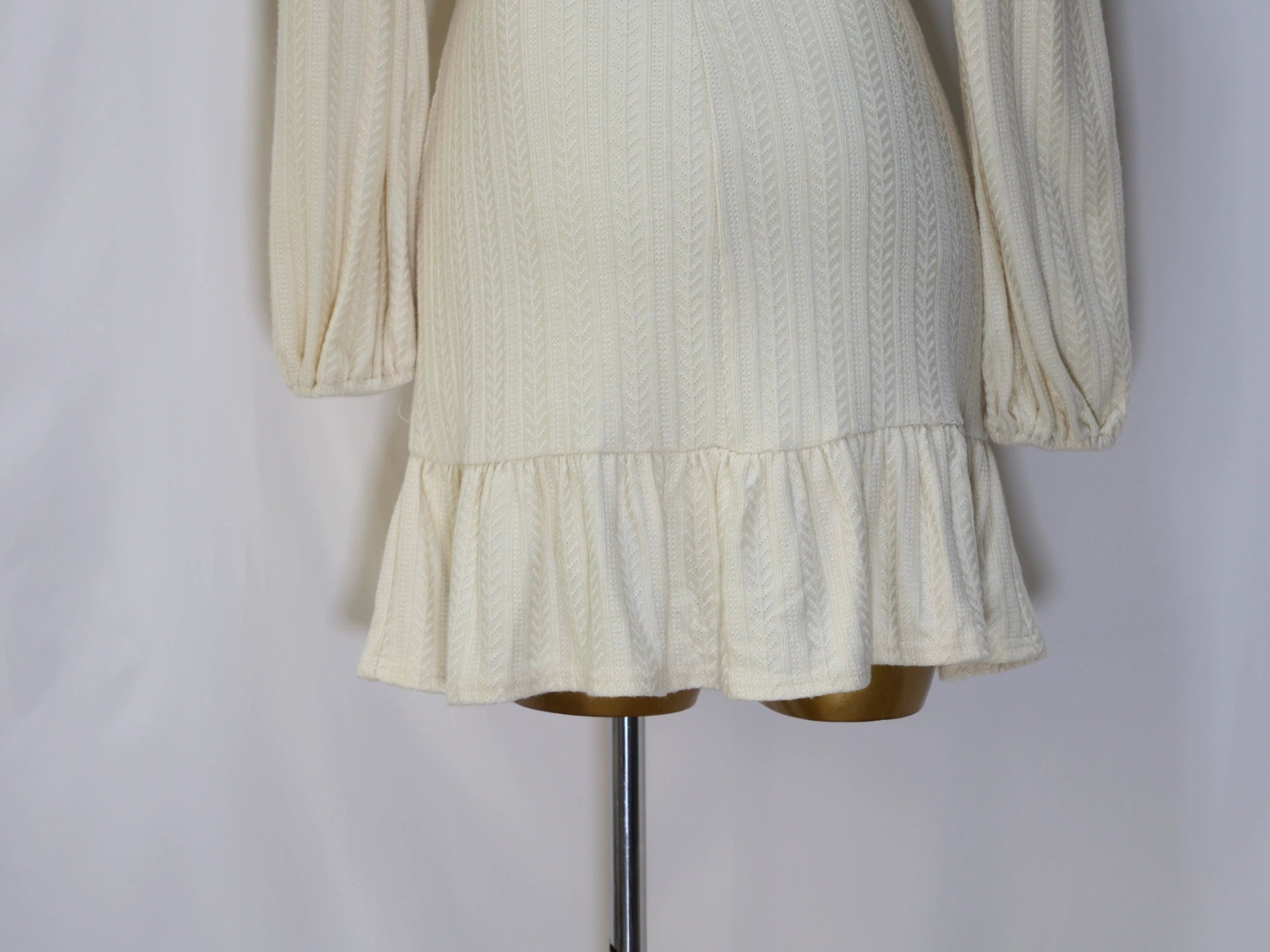 white long-sleeved mini dress