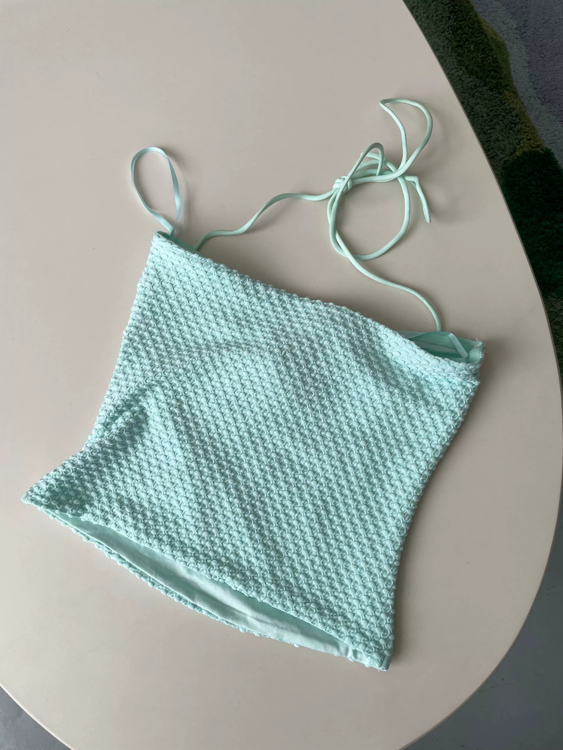 green camisole top