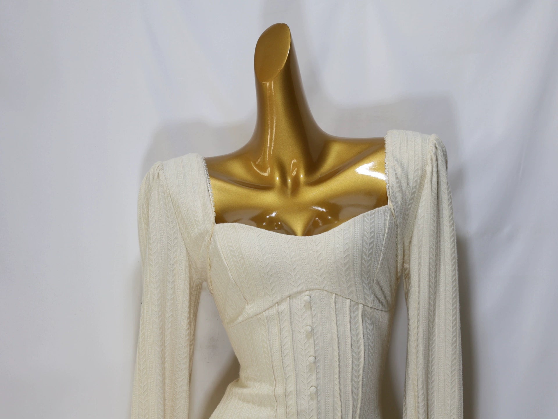 white long-sleeved mini dress