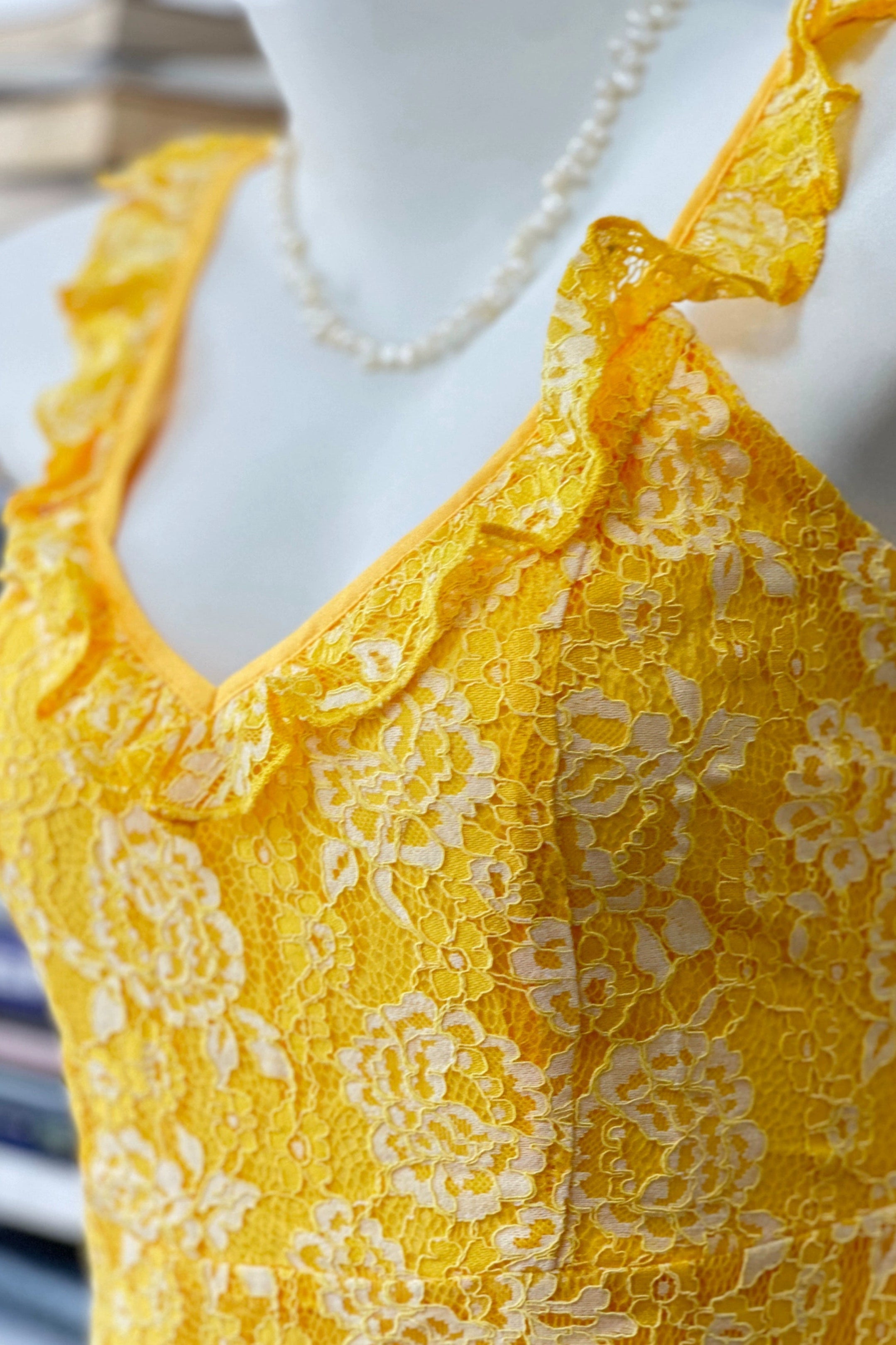 yellow suspender mini dress
