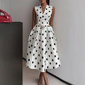 white polka dot strapless maxi dress