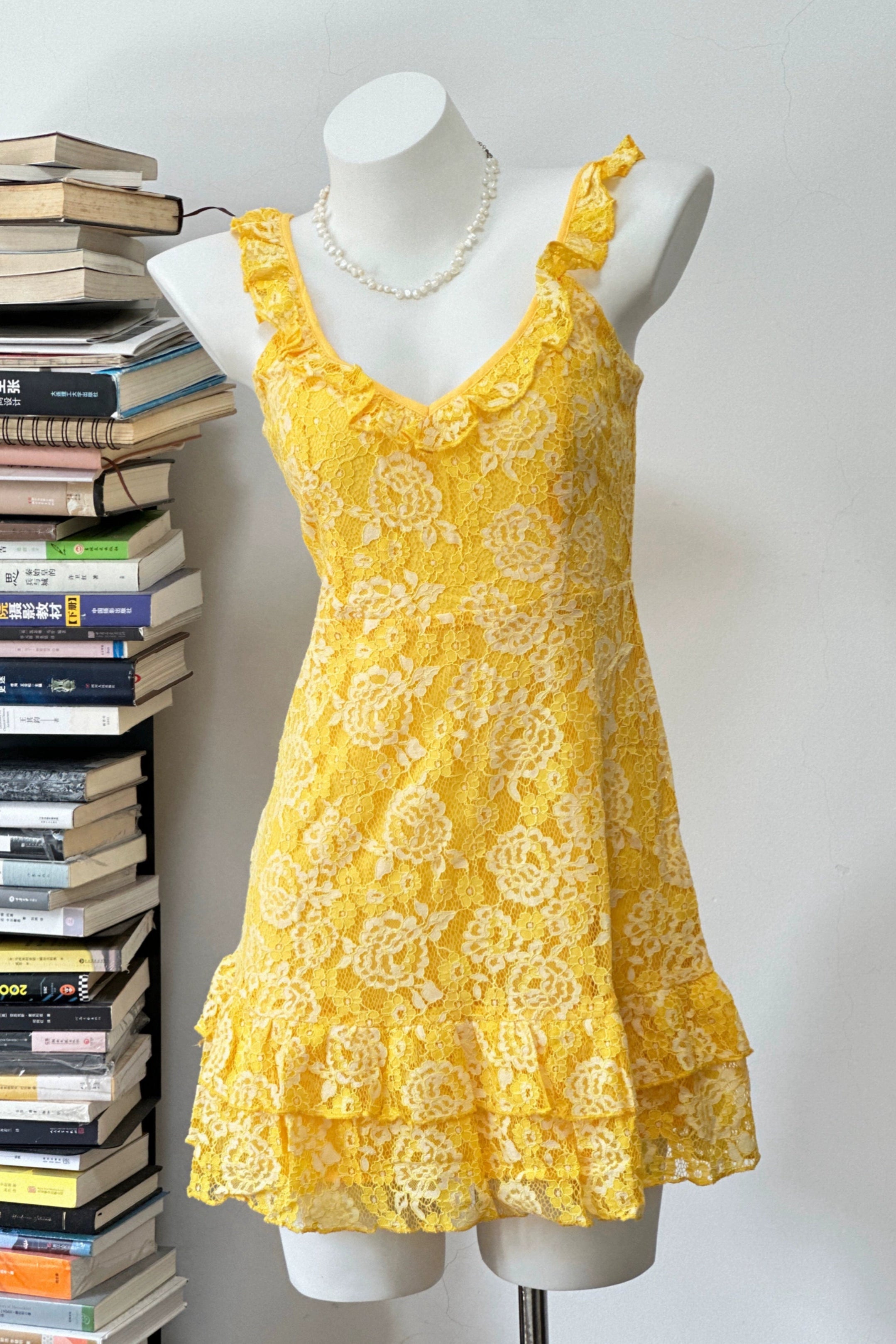 yellow suspender mini dress