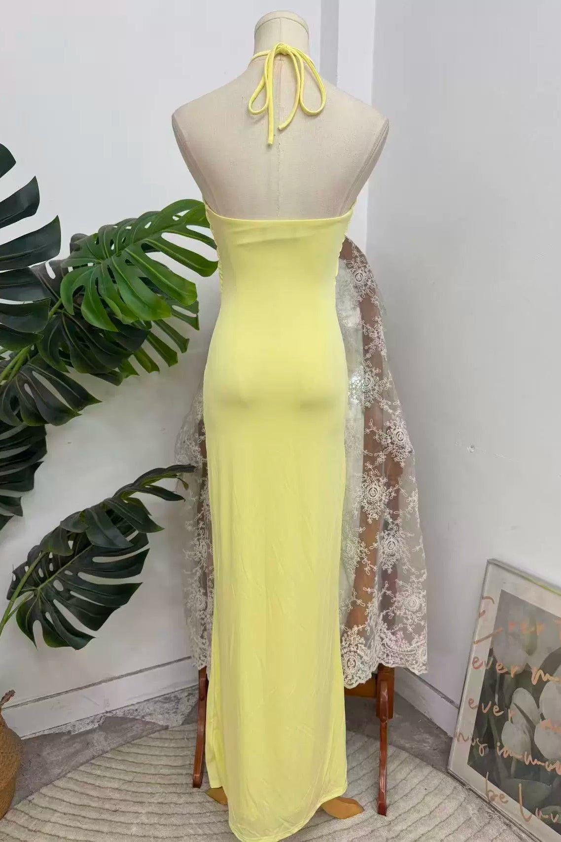 Yellow halter neck long dress with large hollow