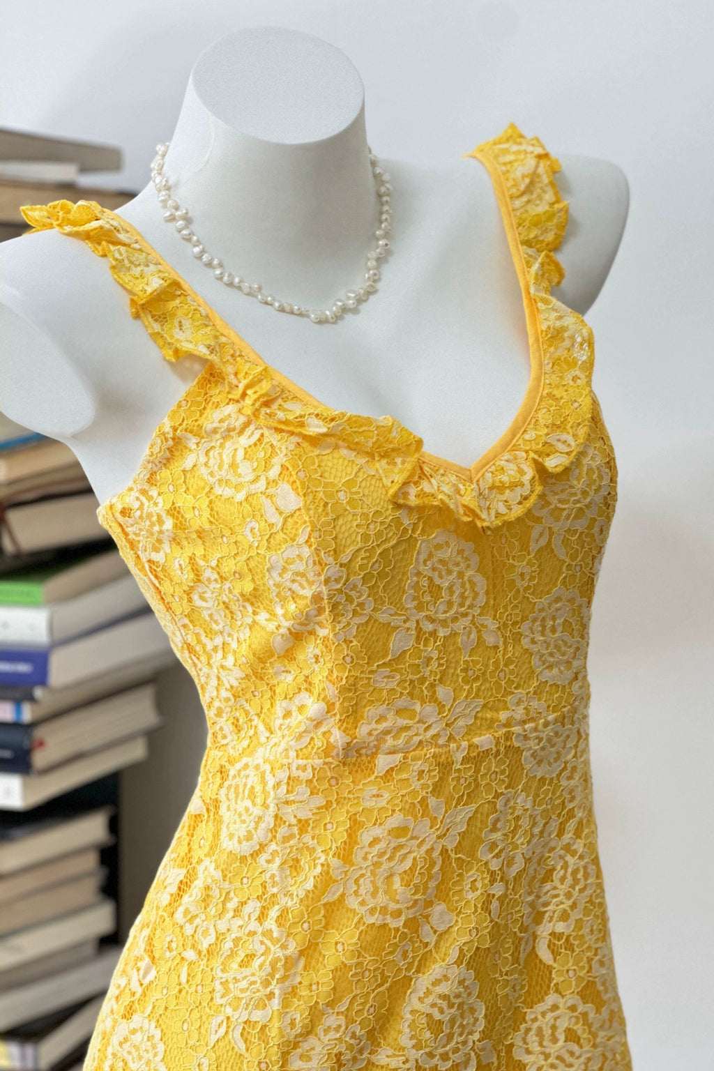 yellow suspender mini dress