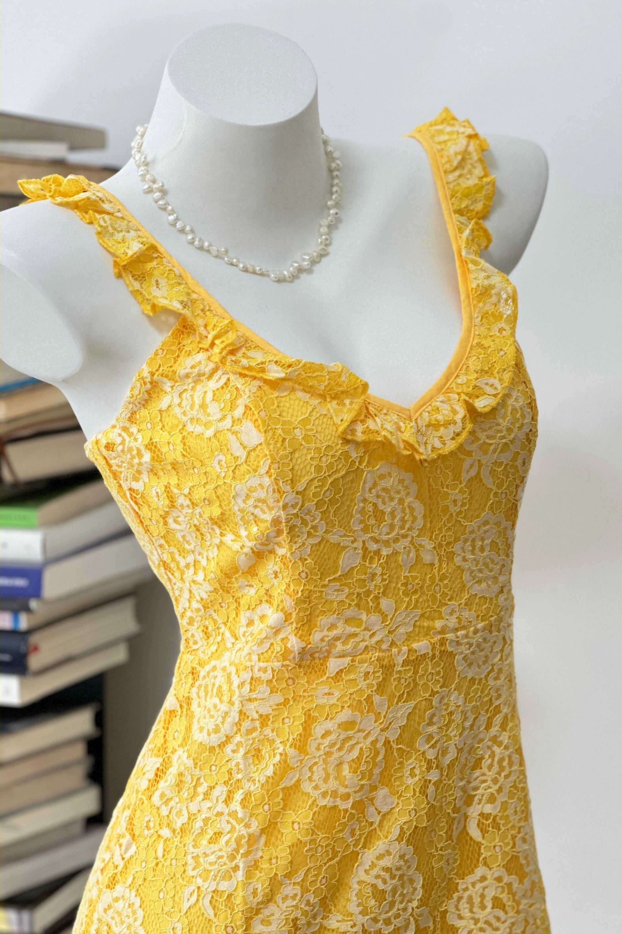 yellow suspender mini dress