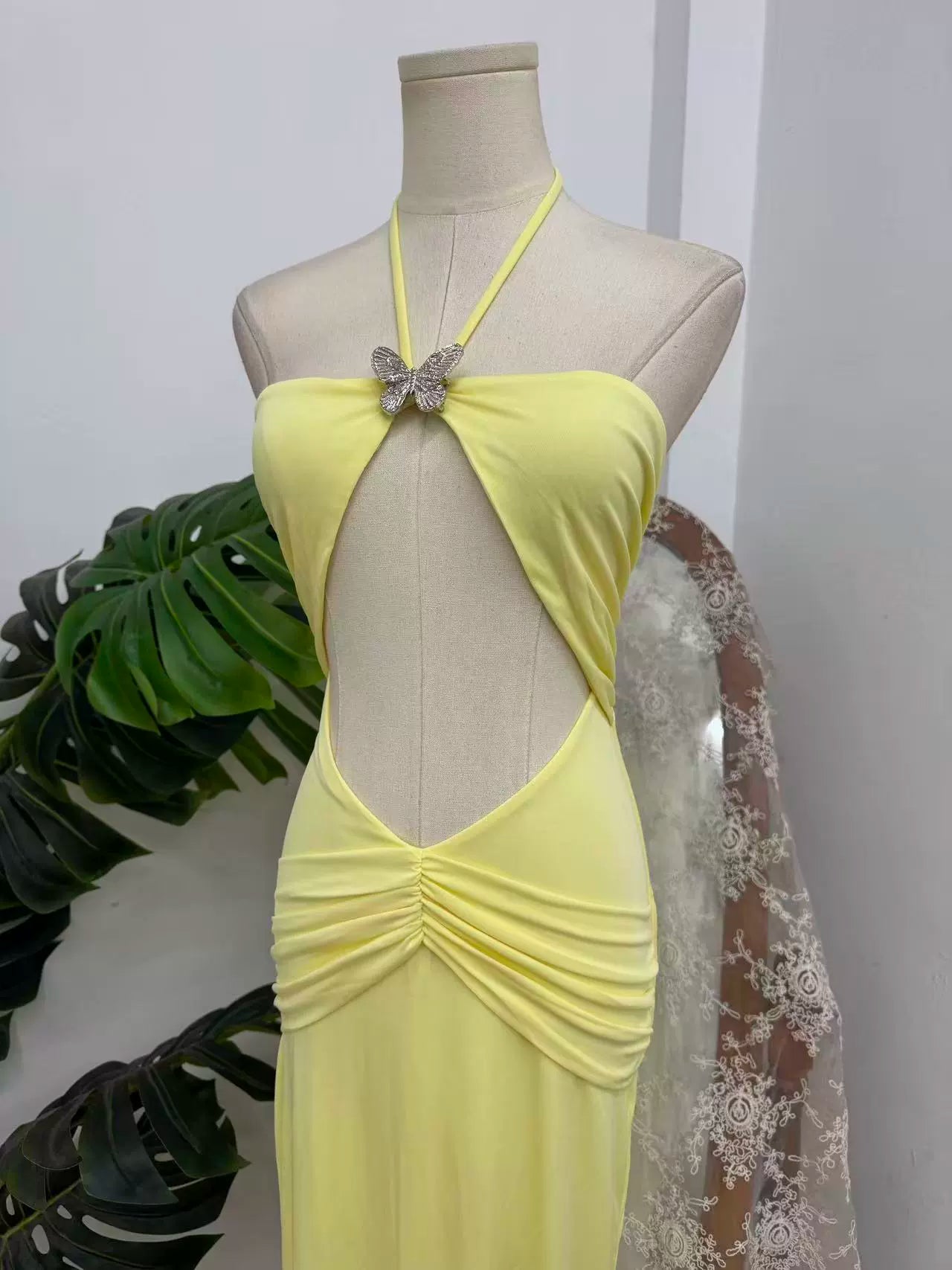 Yellow halter neck long dress with large hollow