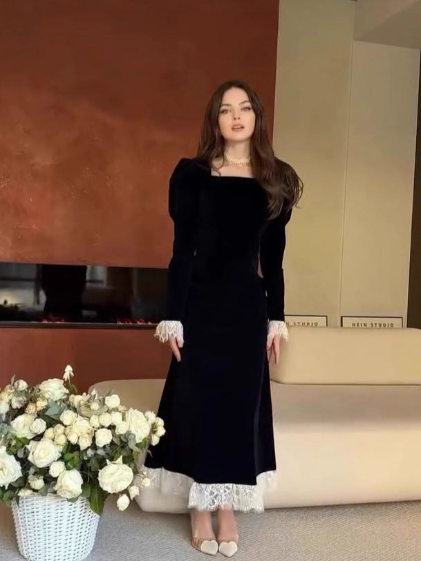 black long-sleeved waist-cinching dress